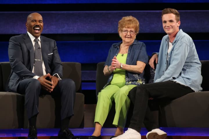 Shelton resident Lillian Droniak, center, and her grandson, Kevin Droniak of Newtown, will appear on NBC&#x27;s &quot;Little Big Shots: Forever Young&quot; with Steve Harvey, left, on Wednesday, July 5.