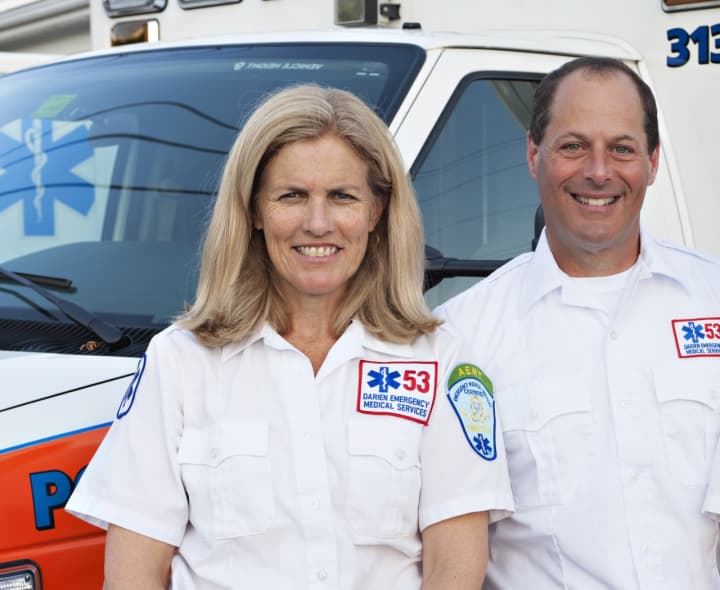 Nancy Herling and outgoing Darien EMS-Post 53 Director Ron Hammer.