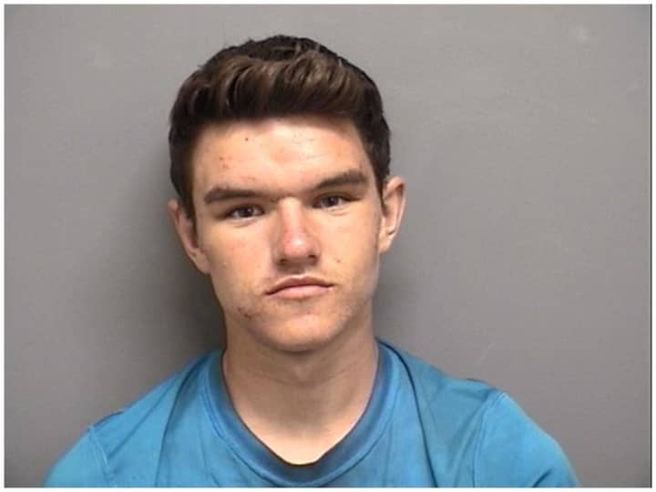 Darien police arrested Iowa resident Alex Nelson after a gas station burglary on the Post Road.