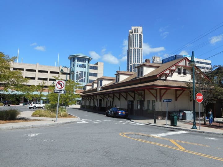 A deceased man was found in his car at the train station in New Rochelle.