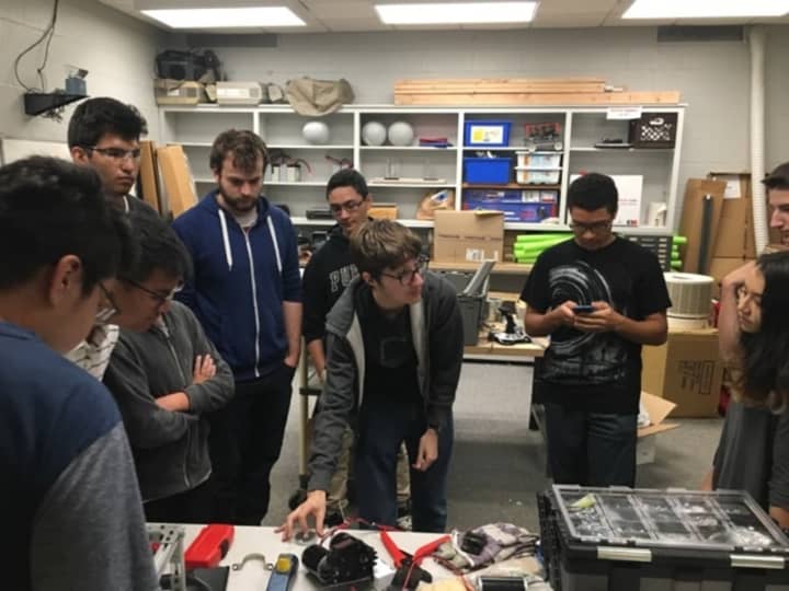Coach Ryan Paulsen and his &quot;New Ro-Bots&quot; team from New Rochelle High School.
