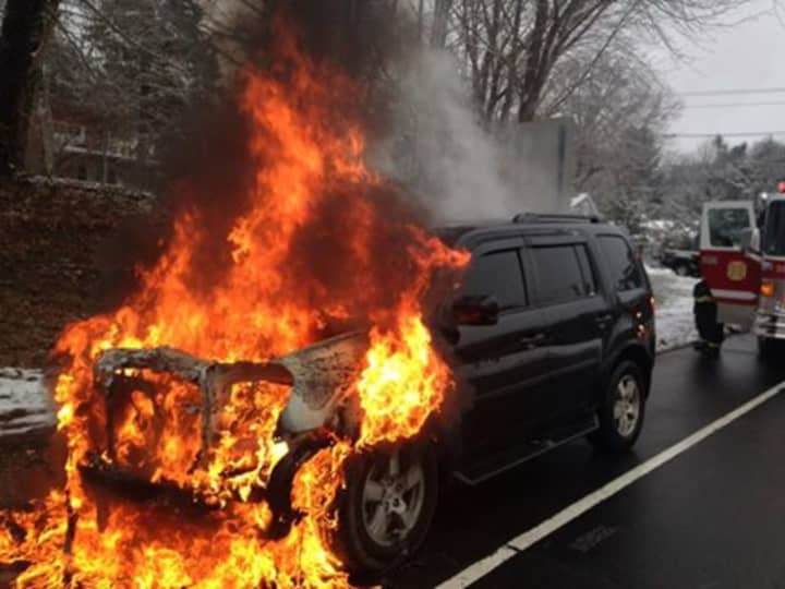 The Nichols Fire Department put out flames after an SUV caught on fire Feb. 10 on the Merritt Parkway southbound entrance ramp.