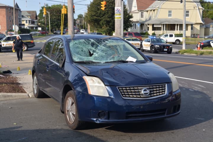 Two crossing guards were hit by a car Tuesday morning in Bridgeport. One remains in critical condition.
