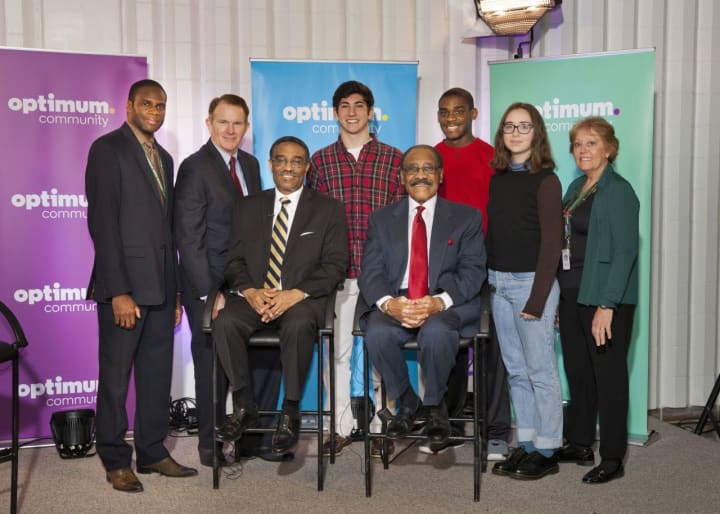 (left to right, standing) Principal Roberts, Kerry Donovan, Max Berman, Saadiq Sterling, Hailey Agostino and Dr. Carol Marinaccio; (left to right, seated) Bruce V. Morris and Bruce L. Morris