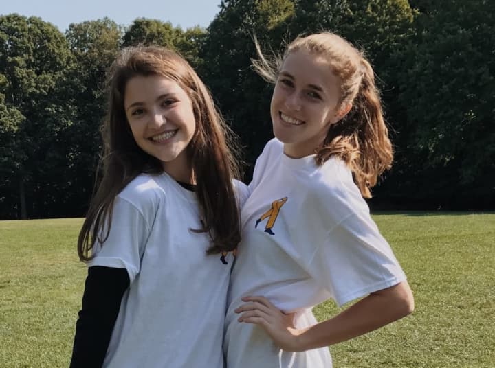 Academy of the Holy Angels students Olivia Mandella and Abigail Sheehan spearheaded a 5K to raise funds for pediatric cancer research.