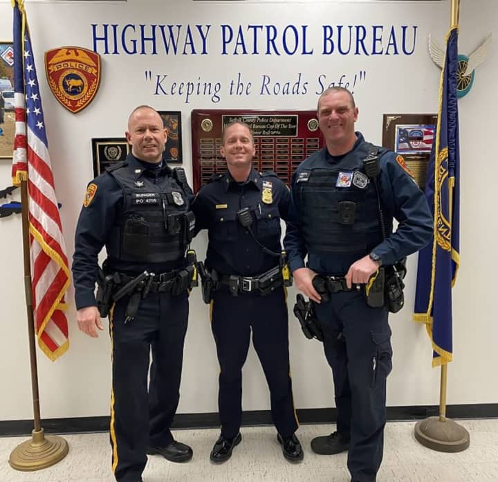Photo of SCPD Highway Patrol officers involved in the delivery of the baby, left to right: Officer Kenneth Bunger, Sergeant Justin Carey, and Officer Matthew Siesto.