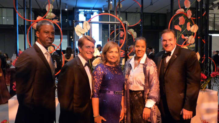 HackensackUHN President and CEO Robert C. Garret (second from left) and his wife, Laura, greeted guests and posed for pictures as they entered the Whitney. Pictured with (from left) Eric Eve, Leecia Eve and HUMC Foundation Board Chairman Ulises Diaz.