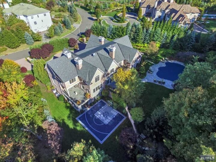 Patrick Ewing&#x27;s Cresskill estate features a basketball court and pool.
