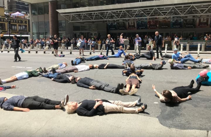Protestors laid down across 8th Avenue between the Port Authority bus terminal and New York Times building.