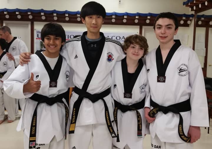 (from left) Curen Sood, Master Changhee Lee of Park Ridge Summit Martial Arts, Nick Lang and Chris Romei