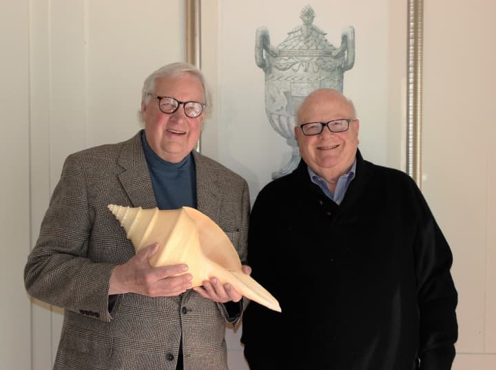 John Jenner, (left) holding a giant horse conch, and Joel Third, who collects rare antique maps, will give a talk at the Keeler Tavern Museum in Ridgefield.