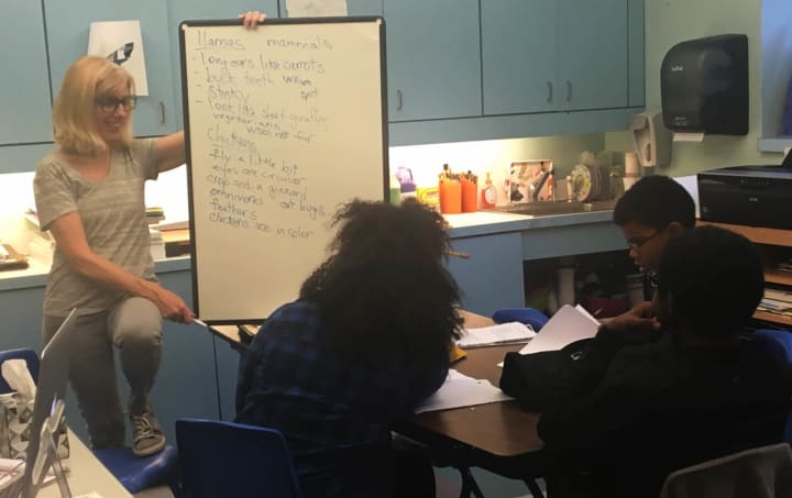 Author and poet Page McBrier brainstorming with students from the Norwalk Housing Authority