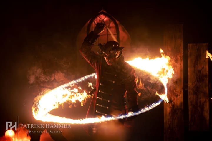 Paranormal fire whip act.