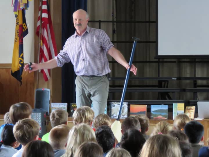Peter Lourie entertains Royle fourth graders with his stories.