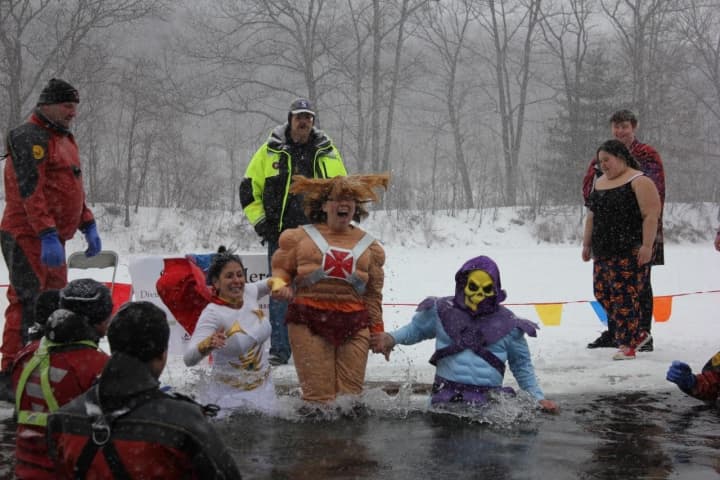 Superheroes take the plunge to help fight Alzheimer&#x27;s.