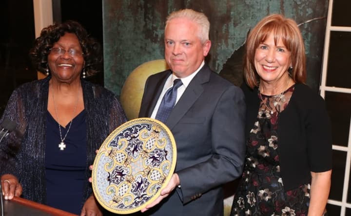 Rev. Jeannette Phillips, HRHCare founder, and Anne Kauffman Nolon, HRHCare president and CEO, presenting an award to ArchCare President and CEO Scott La Rue.