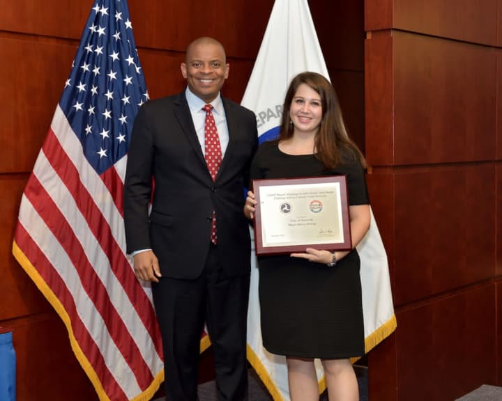 U.S. Secretary of Transportation Anthony Foxx and Kaitlin Latham, health education associate at the Norwalk Health Department, who accepted the Mayor’s Challenge Award for the City of Norwalk.