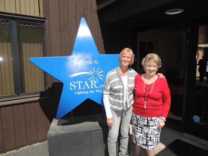Lois Marasco of Norwalk (right ) and Linda Snell of Fairfield both celebrate 25 years of service with local agency, STAR Inc., Lighting the Way