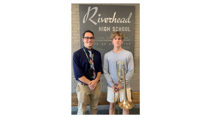 Riverhead High School Band Director Joseph Randazzo and NYSSMA All-State bass trombone player Bryan Enos