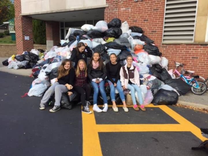 Eighth-grade volunteers helped make the Pleasantville PTA’s used-clothing drive a success