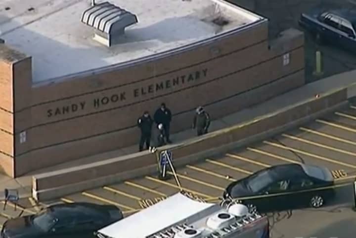 Police at Sandy Hook Elementary following the mass shooting.