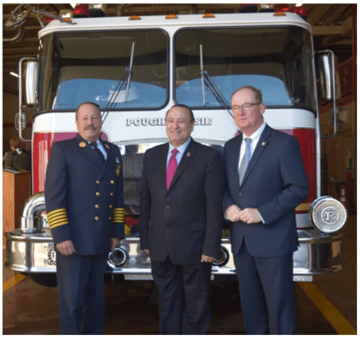 The city of Poughkeepsie has been awarded a $1 million grant to replace a 20-year-old firetruck and other apparatus. From left are Fire Chief Mark Johnson, state Assemblyman Frank Skartados and Mayor Rob Rolison.