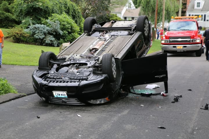 A Nissan Sentra struck a parked car and flipped on its roof on Pemburn Drive Friday afternoon.