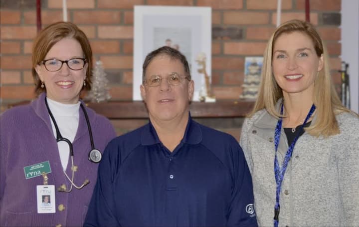 Gary Furtak (center), who recently received a total knee replacement procedures on an outpatient basis with Amy Tagg, RN, (left) and Tricia Brody, physical therapist (right), both of the Ridgefield Visiting Nurse Association.