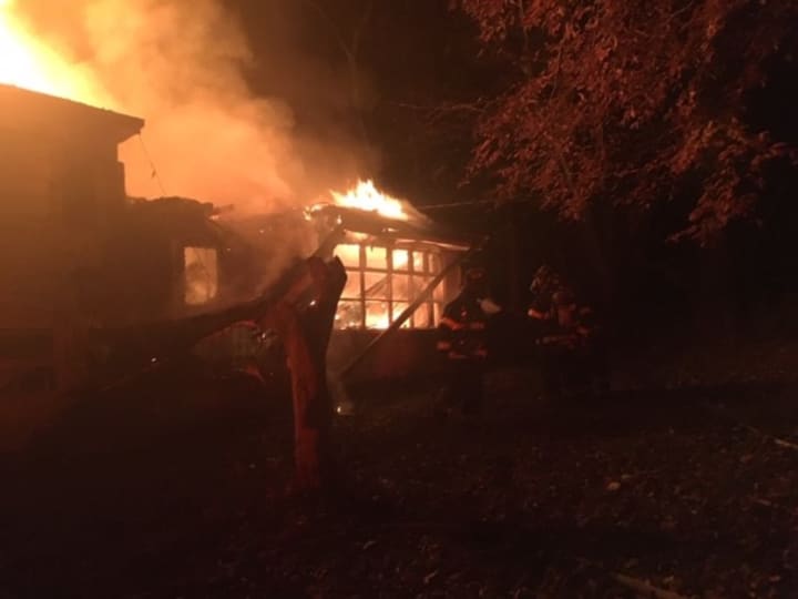 A roaring fire left one person homeless and required 35 firefighters to douse.