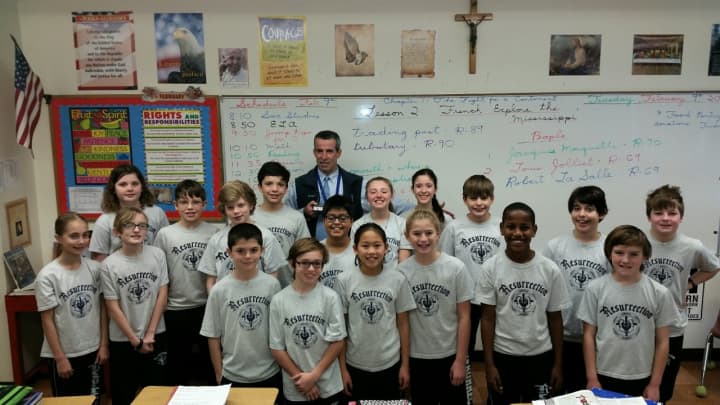 Mike Meade, a fifth grade teacher at Resurrection School in Rye was honored last month as an &quot;Outstanding Teacher&#x27;&#x27; by the Archdiocese of New York. Meade celebrated his recent award with Resurrection students.