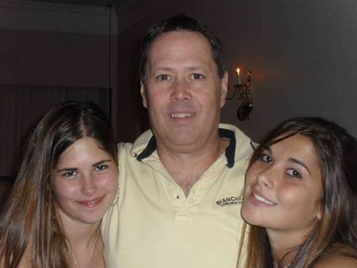 Richard Lauretta of West Milford poses with his daughters.