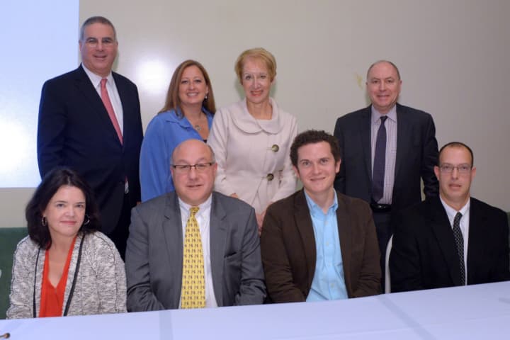 Seated, from left, political forum panelists Beth Fouhy, Steven Greenberg, Adam Edelman and Lane Filler. Standing, from left, BCW Executive Vice President John Ravitz; Board Member Taryn Duffy, President Marsha Gordon; and Board Member George Lence.