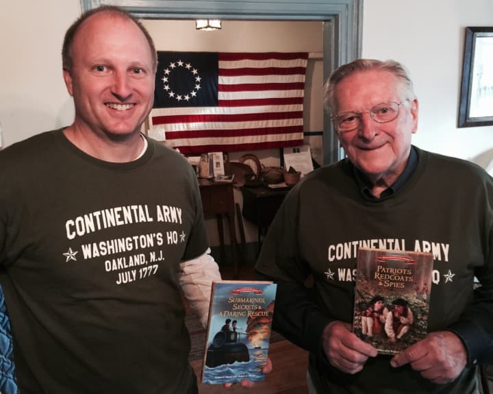 Rob and Bob Skead with copies of their books.