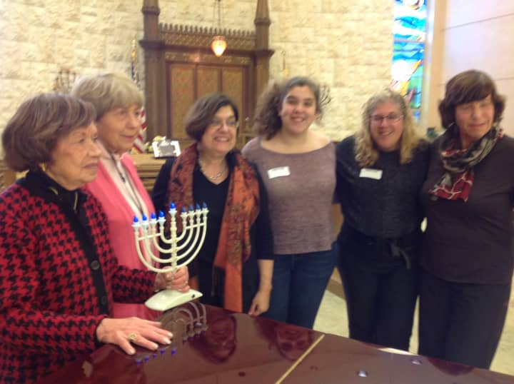 Left to Right: Phyllis Schriger, Peggy Kabakow, Susan Laskin, Samantha, Carol Silverman Kurtz, Elizabeth Halverstam attend the NCJW Hanukkah Party
