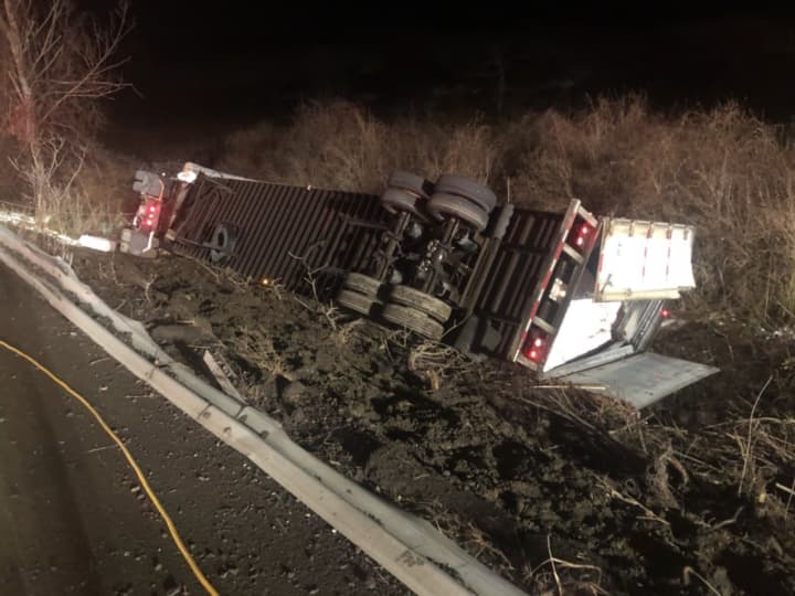 A tractor-trailer flipped on Route 22 in Northeast when the driver attempted to avoid a collision.