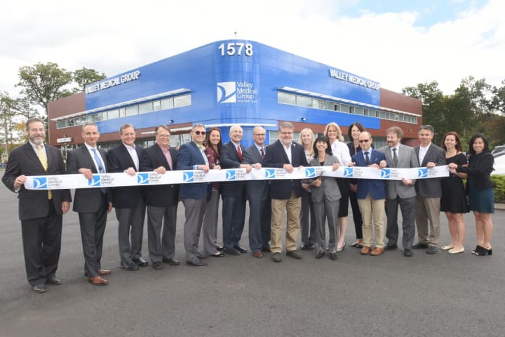 Trustees, doctors and staff from Valley Medical Group’s new location on Route 23 North in
Wayne cut the ribbon on a new urgent care and multispecialty practice.