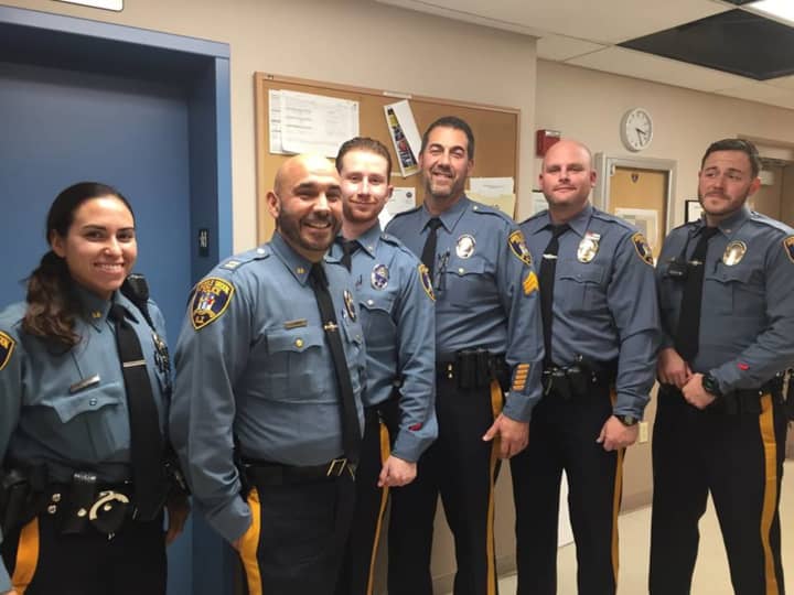 Members of the Saddle Brook Township Police Department stand together.
