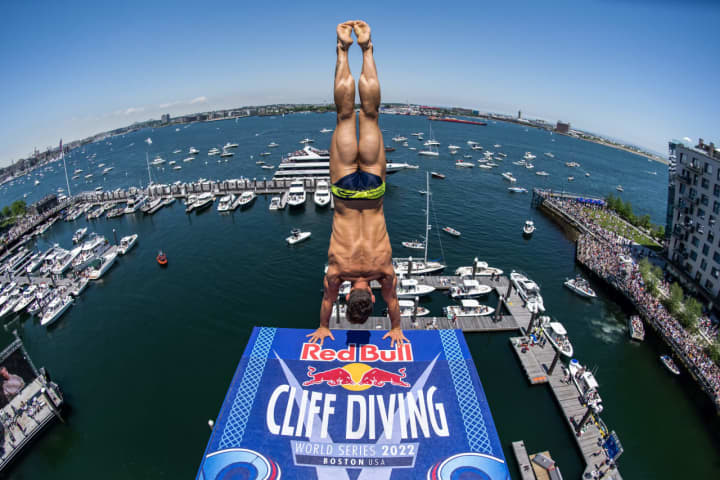 Constantin Popovici of Romania prepares to dive from the 28 meter platform during final competition day at the Red Bull Cliff Diving World Series in Boston on June 4, 2022.