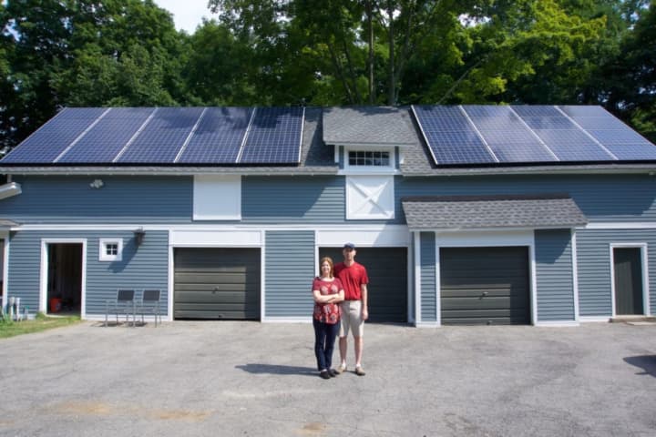 Solarize Somers/New Castle has reduced prices due to the number of people signing up for the program. Peter Martin and Kendal Sandlin of New Castle said they love the look and are happy with the installation.