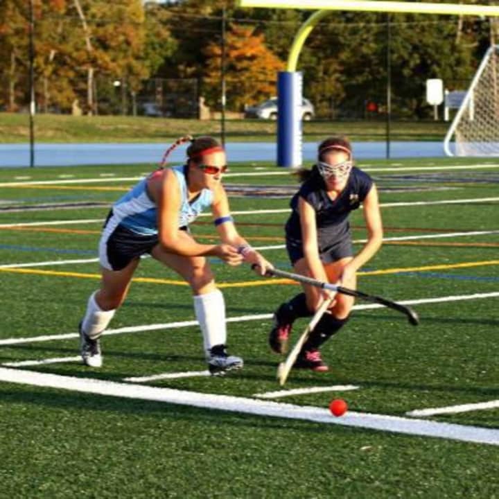 Jenna Sanossian, left, a sophomore at Pace University in Pleasantville, has been invited to play field hockey in a tour of South Africa. She is trying to raise funds for the trip.