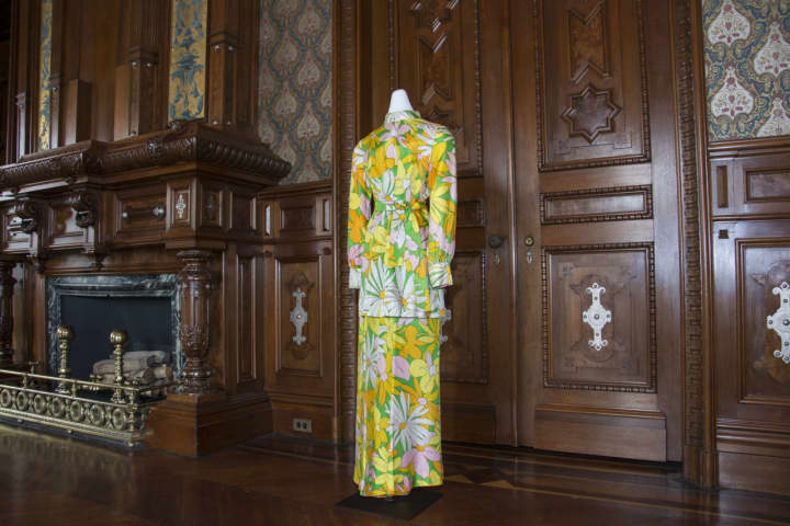 This bold, floral print pantsuit from the late 1960s was designed by Joe Curtis. Collection of Mary Findlay.