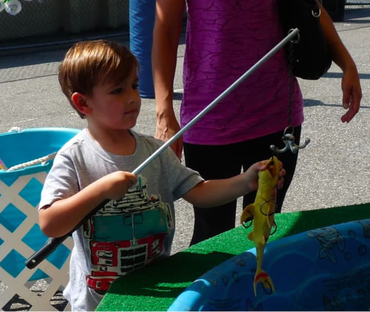 Go Fish! Kids went fishing for prizes at the Lyndhurst Labor Day Street Fair 