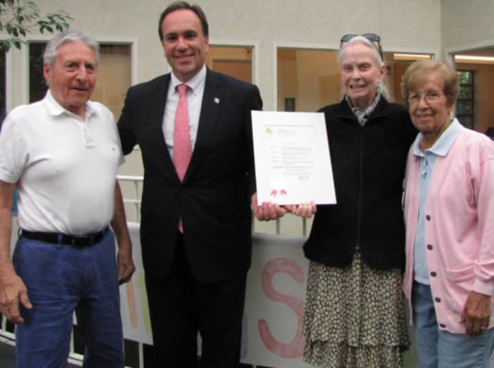First Selectman Peter Tesei celebrates National Adult Day Services Week with River House seniors.