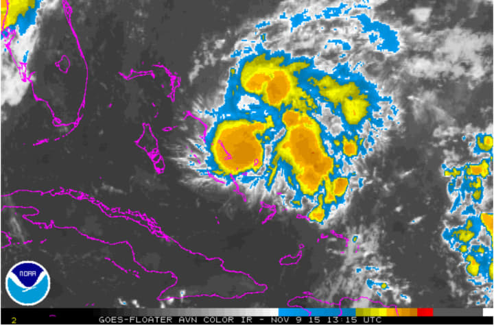 Tropical Depression Twelve strengthened into Tropical Storm Kate Monday morning near the central Bahamas.