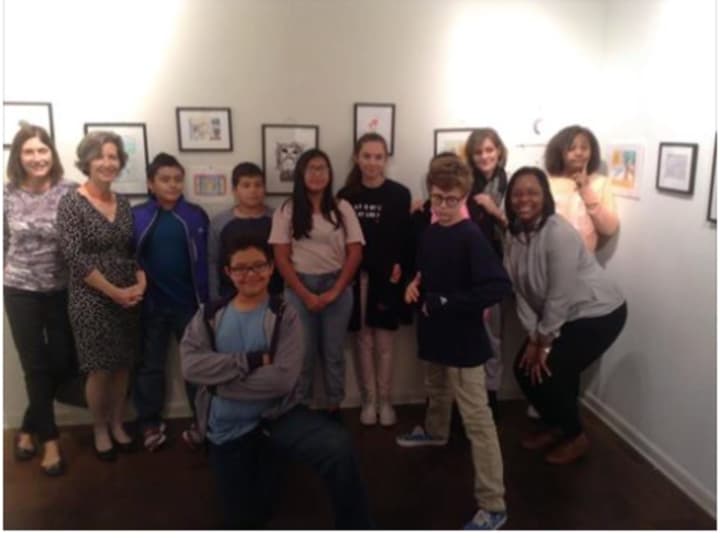 Students from the ASPIRE arts program show off their artwork at a reception at the Rowayton Arts Center.