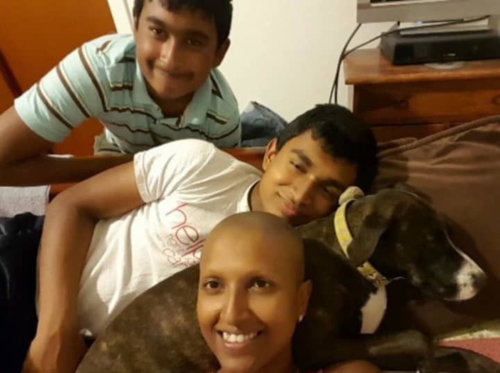Shivonie Deokaran with her two sons and beloved dog, Gia.