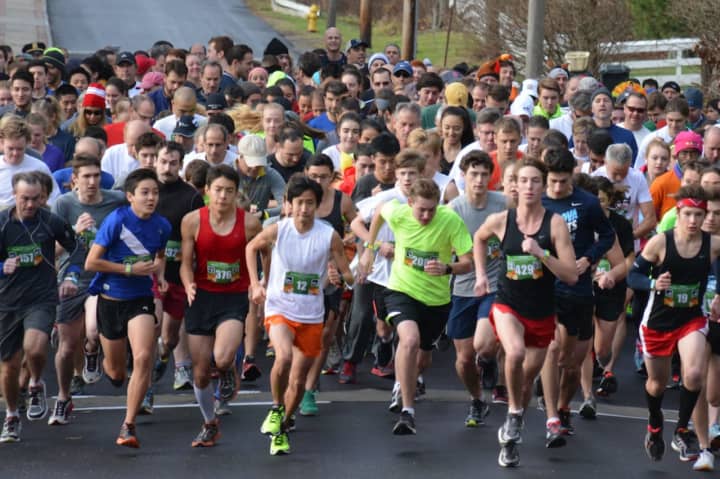 Runners start the 11th annual Bedford Turkey Trot.