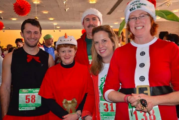 Participants in the Jingle Bell 5k Run/Walk get ready for the event earlier this month.