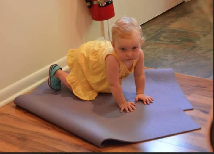 Even youngsters enjoy yoga classes at Firefly Family Yoga studio in Ridgefield.