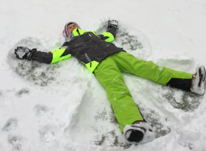 Winter Storm Jonas gives a chance for snow angels to be made as happened here in Tokeneke Saturday morning.